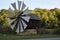 Old historic windmill with sails in Sibiu, Transilvanya. Traditional rustic mill in the countryside