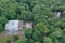 Old historical church and manor palace in derelict park, aerial