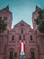 Old historical church picture and Jesus Christ statue in front with blue sky