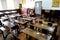 Old historical classroom with wooden desks and chalkboards