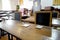 Old historical classroom with wooden desks and chalkboards