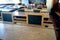 Old historical classroom with wooden desks and chalkboards