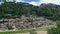 Old historical white buildings in green mountain slope. Berat old town, Albania