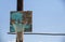 Old homemade wooden basketball hoop against the sky. Horizontal bar from a steel bar