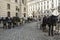 Old horse-drawn carriage riding on city street at Hofburg palace in Vienna. Horse carriages  in vintage style carriages with