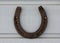 Old horseshoe hanging on the wall