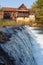 An old house on the cascades of the Dobra River