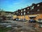 Old house  court courtyard sky blue cars