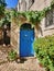 Old house in Rovinj in Croatian Istria with blue doors and cat