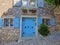 Old house in Rovinj in Croatian Istria with blue doors and shutters