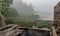 Old house ruins, fog landscape, lake shore mist, blurred landscape