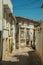 Old house with scaffolding for refurbishment in an alley