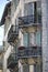 Old house with small french balconies, France