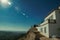 Old house and stone breastwork with mountainous landscape