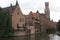 Old houses with the Beffroi tower in the background in Bruges