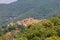 Old houses and bell towers on the hill on Elba Island, Marciana