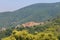 Old houses and bell towers on the hill on Elba Island, Marciana