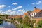 Old houses and river in the village of Winsum