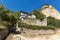 Old houses, sand pyramids and ruins of Saint Barbara church in town of Melnik, Bulgaria