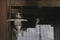 OLd Hurricane Storm Lantern, Kerosene Lamp Hanging on Wooden Beam