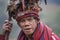 Old ifugao man in national dress next to rice terraces. Banaue, Philippines.