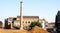 Old industrial chimney in the hospital compound of the Hospital de la Santa Cruz y San Pablo in Barcelona