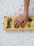 Old intelligence games, wooden mancala game, a person playing mancala