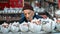 Old Iranian man selling teapots in in his shop in Grand Bazaar of Isfahan, Iran