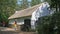 Old Irish Traditional Whitewashed Cottage with a thatched roof at The Ulster America Folk Park Northern Ireland