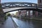 Old iron bridge spanning the industrial canal`s of the city of Birmingham