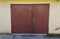 Old iron brown garage doors