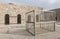 Old Iron Cell Bars and Stone Wall in Courtyard of Famous Yuma Territorial Prison State Historic Park