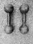 Old iron dumbbells.  Black and white photography.