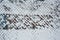 Old iron fence netting covered with snow