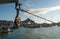 Old iron pulley on winch in front of harbour at Ilfracombe, Devon