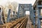 Old iron railroad bridge in remote rural area in Europe