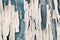 Old irradiated burnt white paint on old wooden background, ideal for background in interior