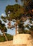 Old Istrian town of Novigrad, Croatia. A beautiful church with a high elegant bell tower, stone alleys and old Mediterranean house