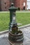 Old Italian outdoor water tap in the castle of Sforza,