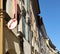 Old italian public telephone circle sign from the Eighties, with red telephone receiver.