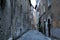 Old Italian town Mediterranean buildings ancient narrow street antique lamp closed doors