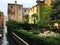 Old italian, venetian courtyard with many green plants