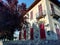  Old Italian villa red shutters balcony  and red prunus trees