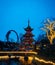 Old japanese pagoda and rollercoaster in Tivoli gardens Copenhagen