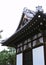 Old Japanese shrine or pagoda entrance with wooden roof decorations background