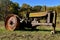 Old John Deere tractor missing front wheels