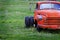 Old Junked Red Work Truck Abandoned in Green Field