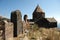 Old Khachkar (cross) in The Island Monastery or Sevanavank (church) in Sevan Island, Armenia