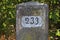 An old kilometer stone on the Old Rhine near Eggenstein in Germany