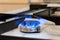 Old kitchen stove cook with blue flames burning. Can be a source of fire or explosion. Household gas stove. In kitchen room